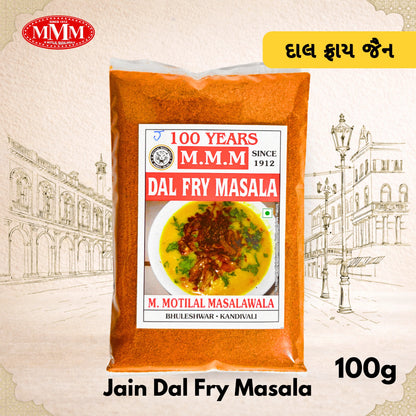 Pack of Jain Dal Fry Masala with M.M.M branding on a decorative background
