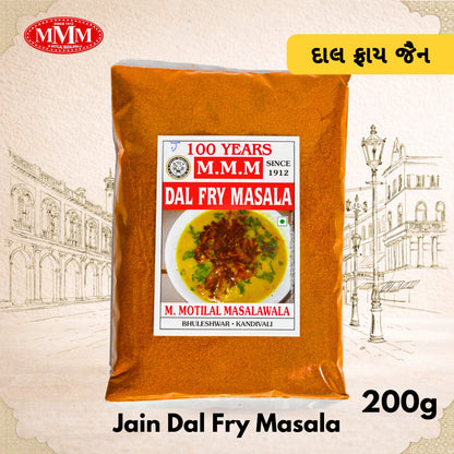 Pack of Jain Dal Fry Masala with M.M.M. branding on a decorative background
