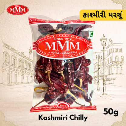 Packaged Kashmiri chilly with MMM brand label on a decorative background