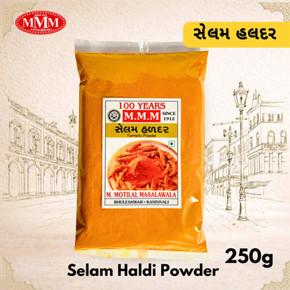 Orange package of Selam Haldi Powder with M.M.M. branding on a decorative background.